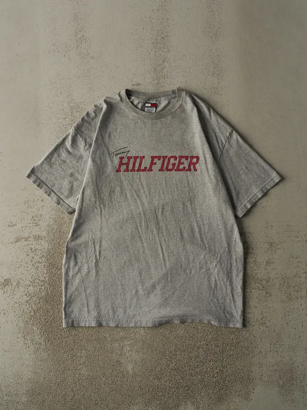 Vintage 90s Grey Tommy Hilfiger Tee (L/XL) sold by Rebalance Vintage