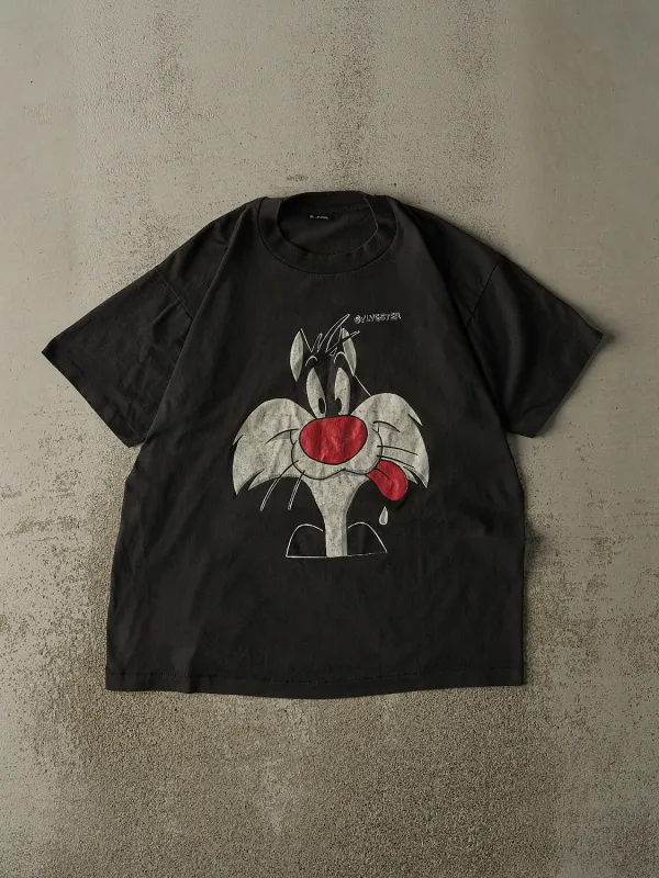 Vintage 80s Black Sylvester Looney Tunes Single Stitch Tee (L) sold by Rebalance Vintage