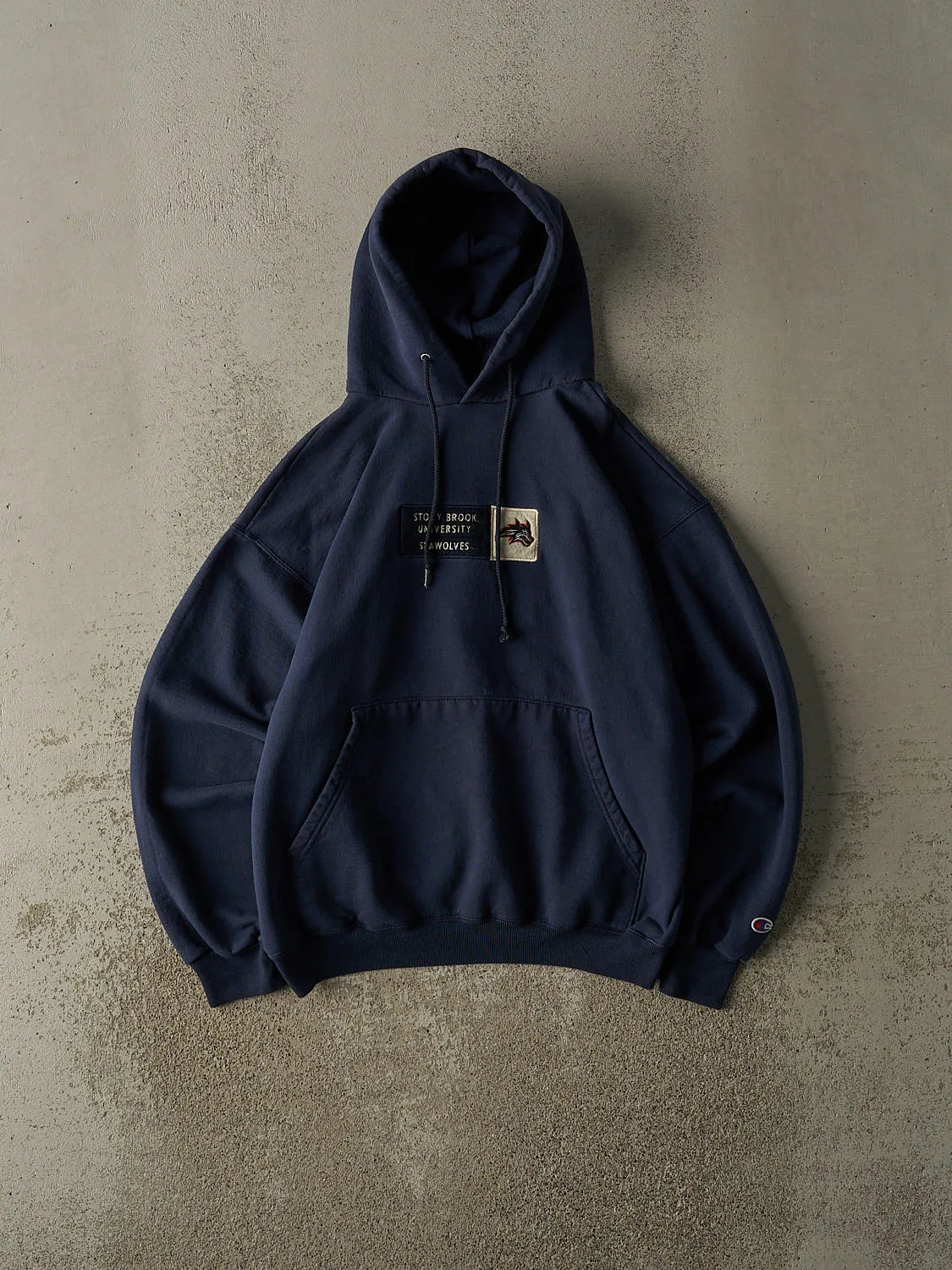 Vintage 90s Navy Blue Stony Brook University Seawolves Embroidered Hoodie (S) sold by Rebalance Vintage