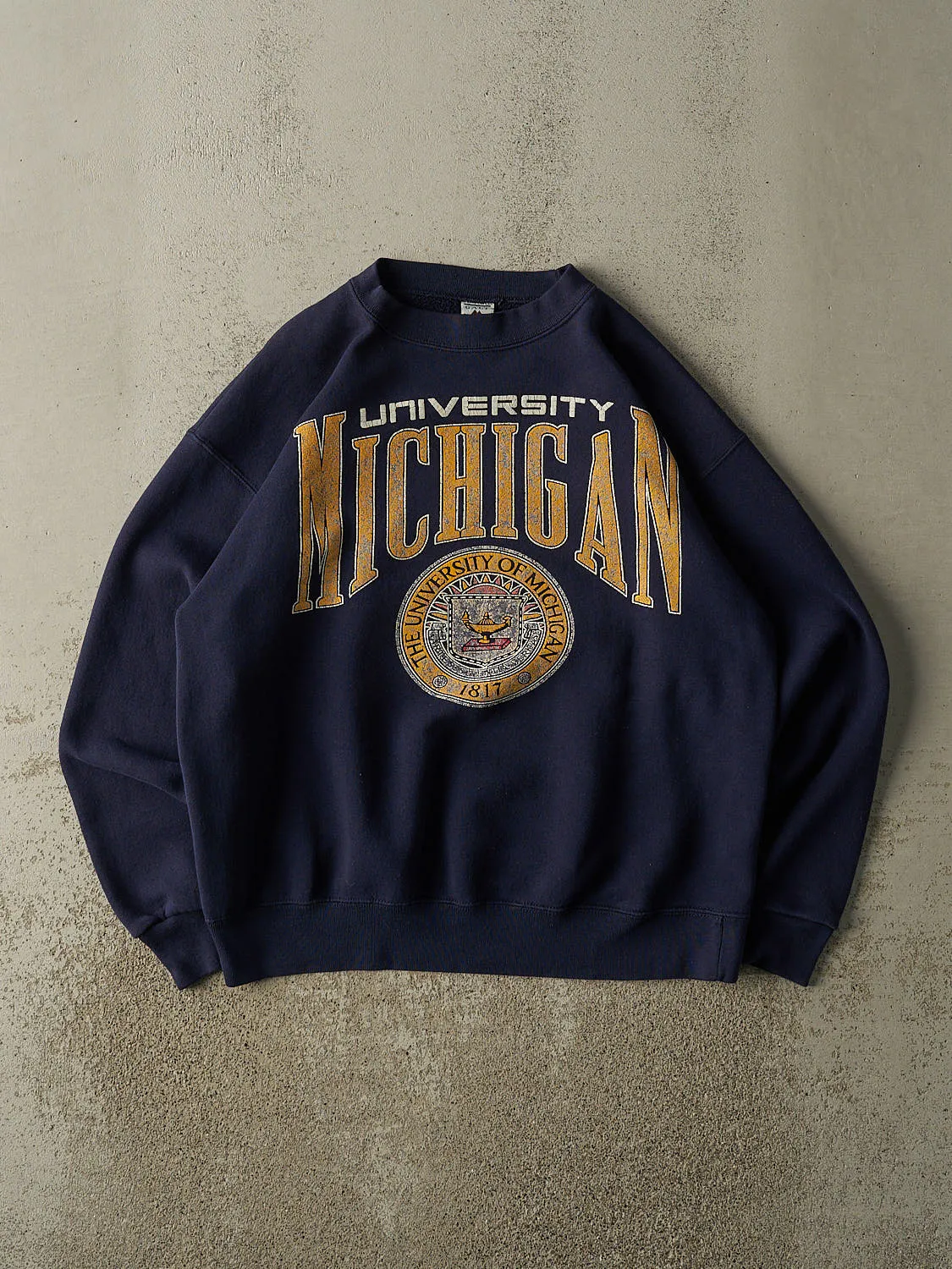 Vintage 80s Navy Blue University of Michigan Crewneck (L/XL) sold by Rebalance Vintage