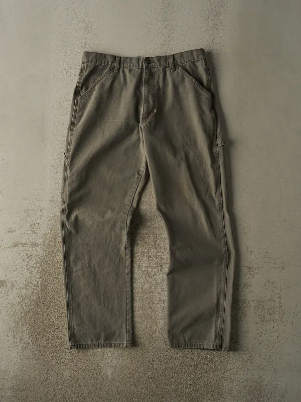Vintage 90s Green Rustler Carpenter Pants (34x31) sold by Rebalance Vintage