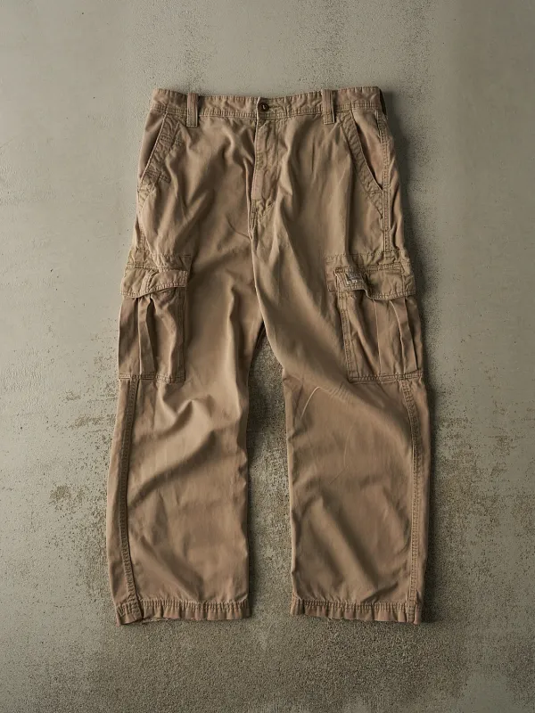 Vintage 90s Beige Levi's Cargo Pants (34x29) sold by Rebalance Vintage