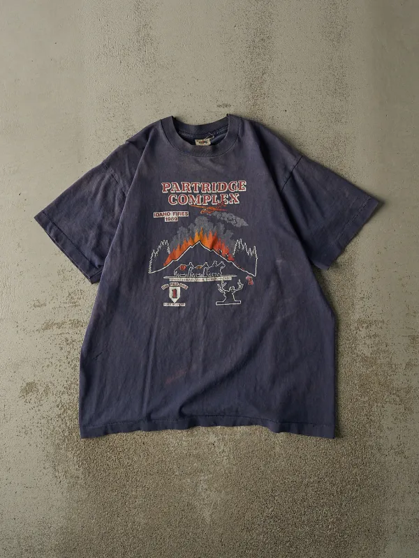 Vintage 89' Sun Faded Navy Partridge Complex Idaho Fires Tee (L) sold by Rebalance Vintage