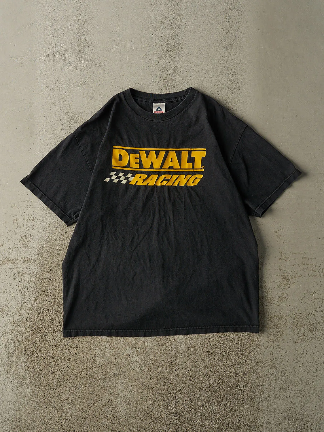 Vintage Y2K Black DeWalt Racing Tee (L/XL) sold by Rebalance Vintage