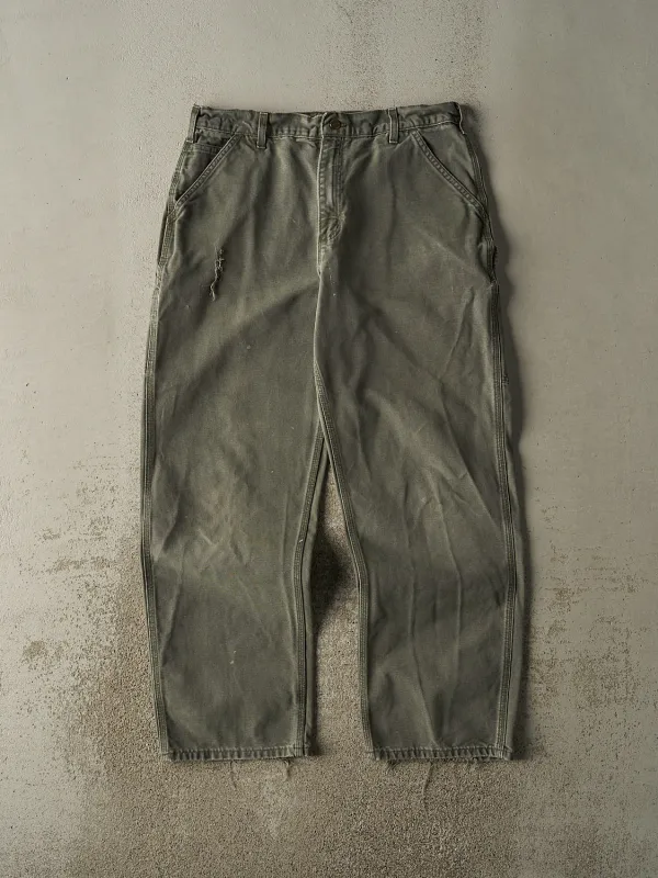 Vintage 90s Green Carhartt Carpenter Pants (34x31) sold by Rebalance Vintage