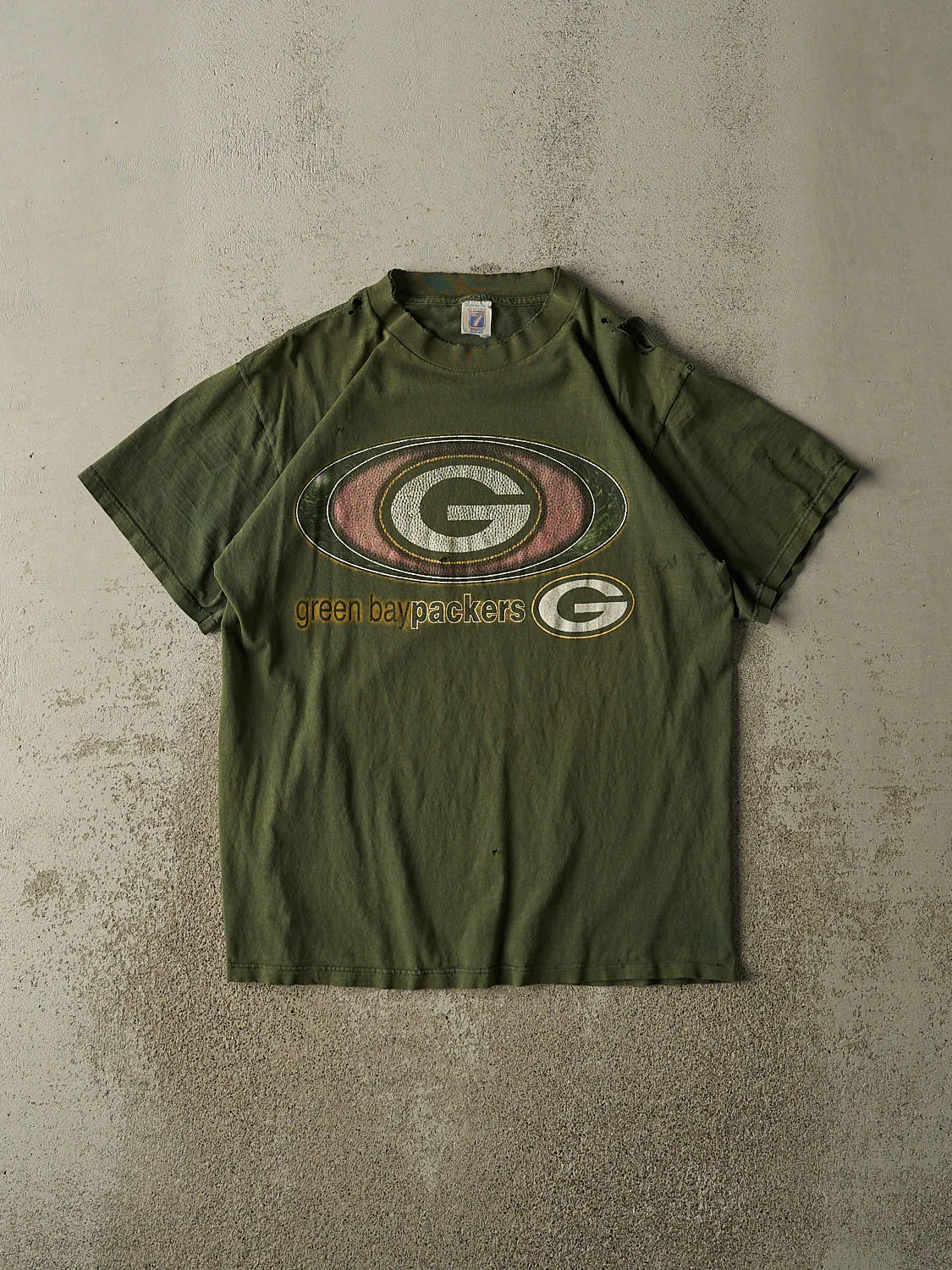 Vintage 90s Sun Faded Green Green Bay Packers Tee (M/L) sold by Rebalance Vintage