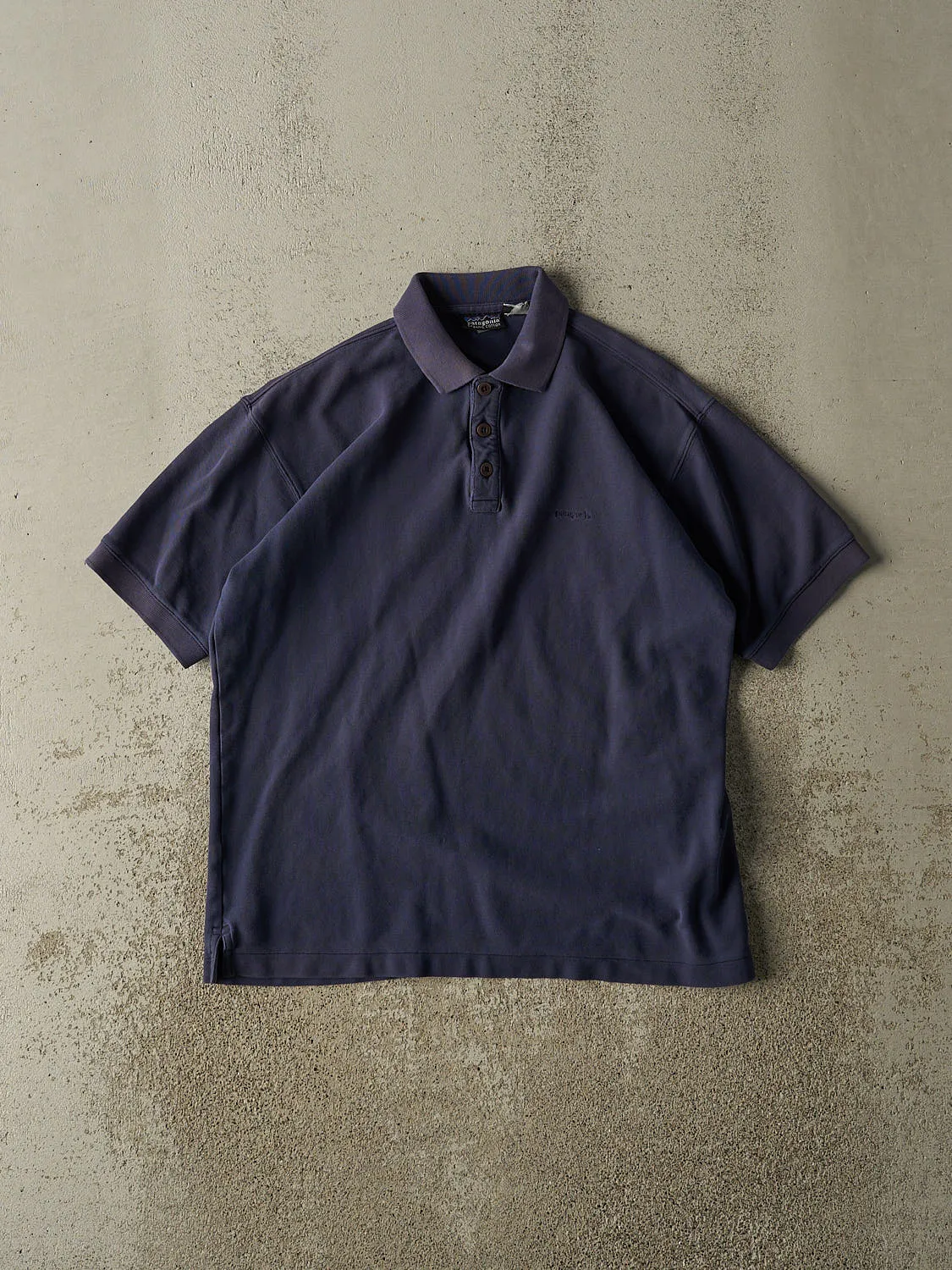 Vintage 90s Navy Blue Patagonia Quarter Button Tee (S/M) sold by Rebalance Vintage