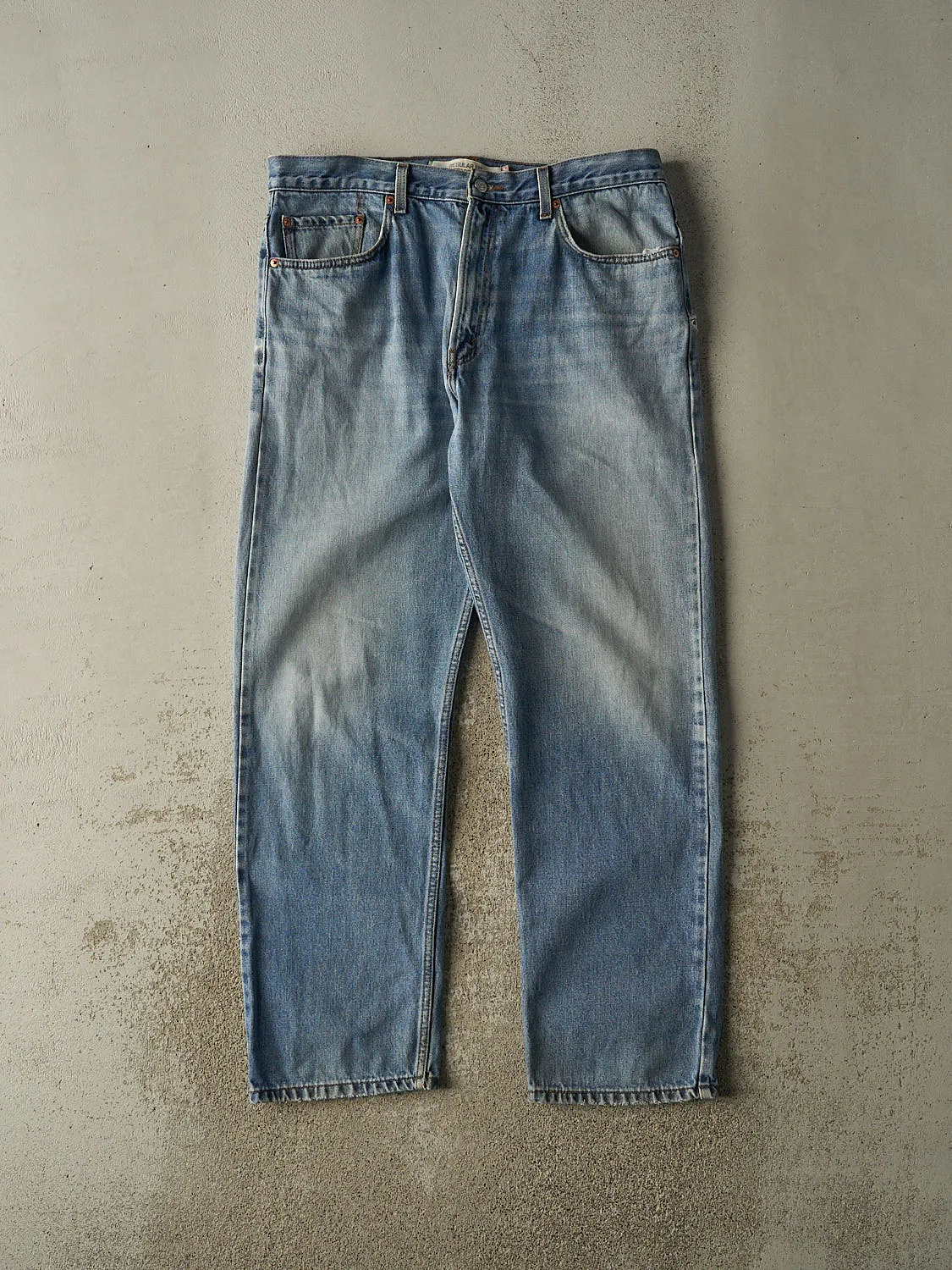 Vintage 90s Light Wash Levi's Jeans (36x32) sold by Rebalance Vintage