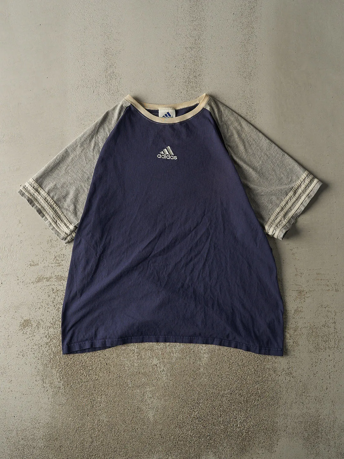 Vintage 90s Navy Blue & Grey Adidas Embroidered Tee (XXL) sold by Rebalance Vintage
