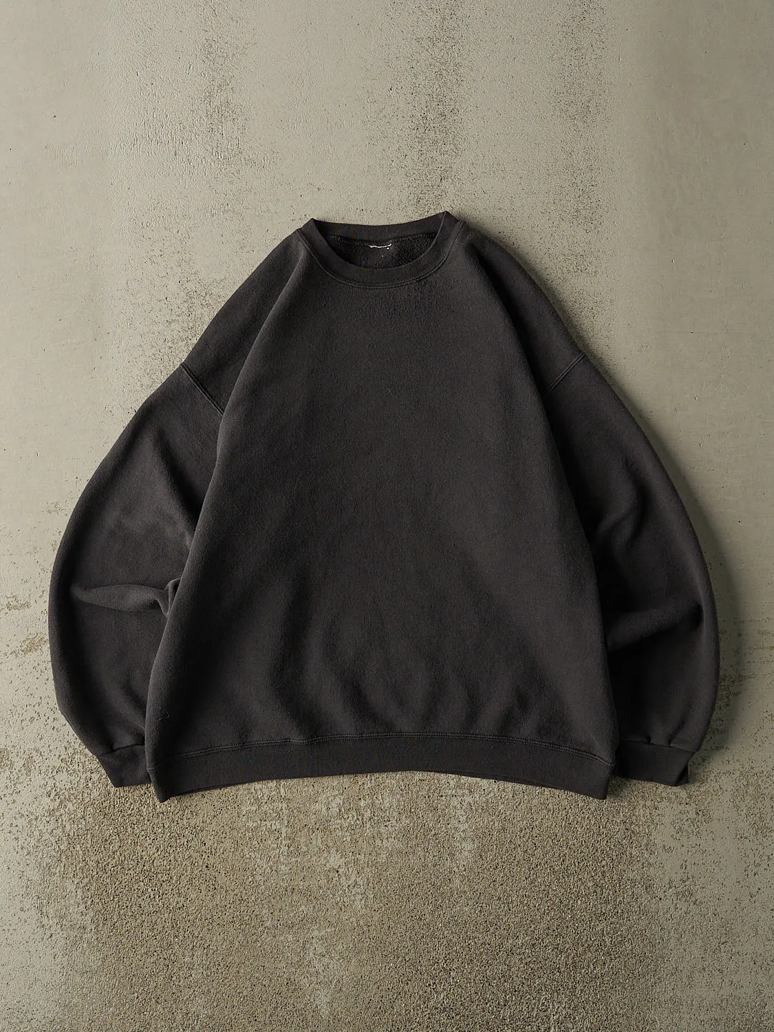 Vintage 90s Faded Black Blank Crewneck (M/L) sold by Rebalance Vintage