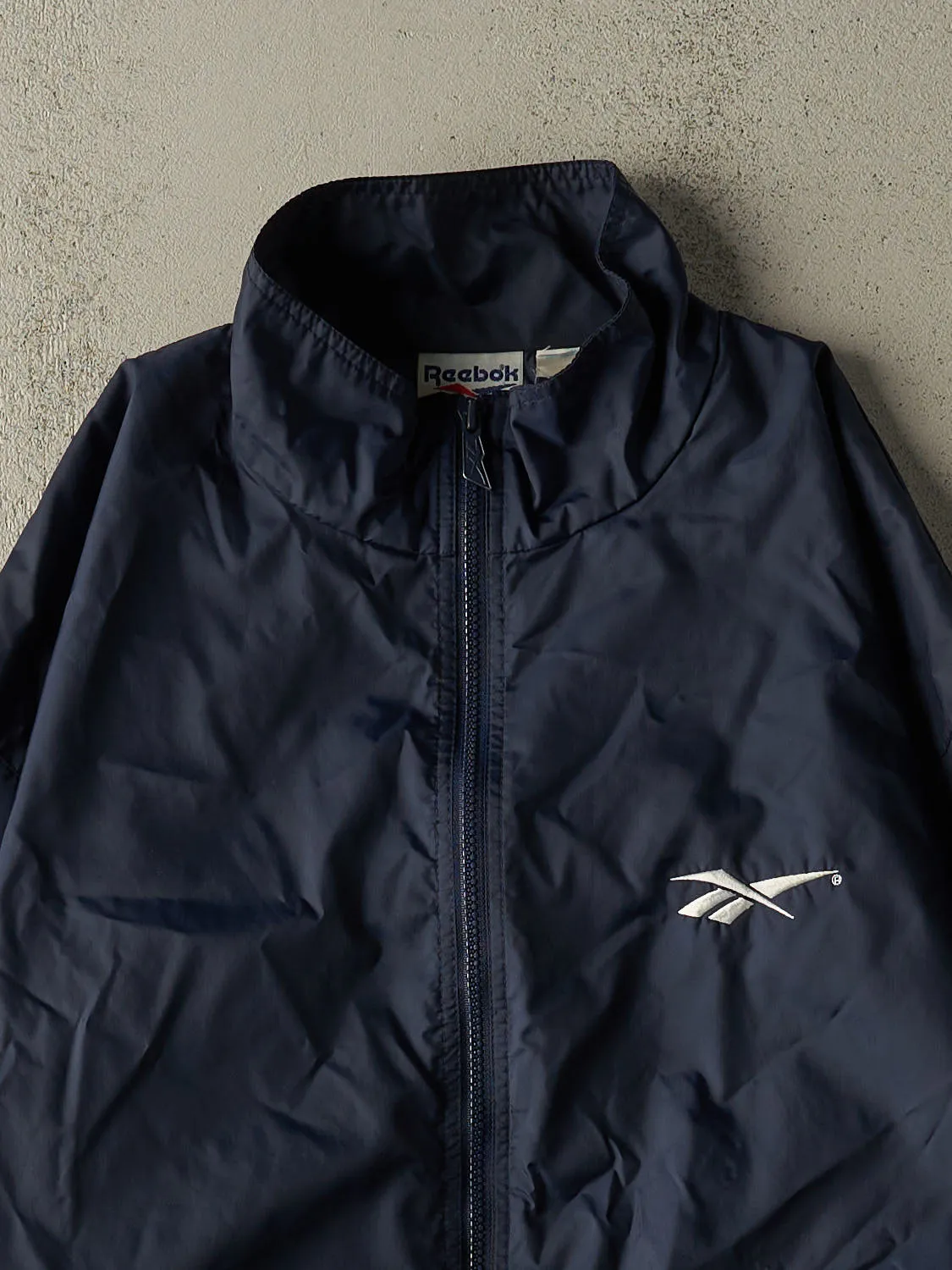 Vintage 90s Navy Blue Reebok Zip Up Windbreaker Jacket (L/XL) sold by Rebalance Vintage product image thumbnail 3