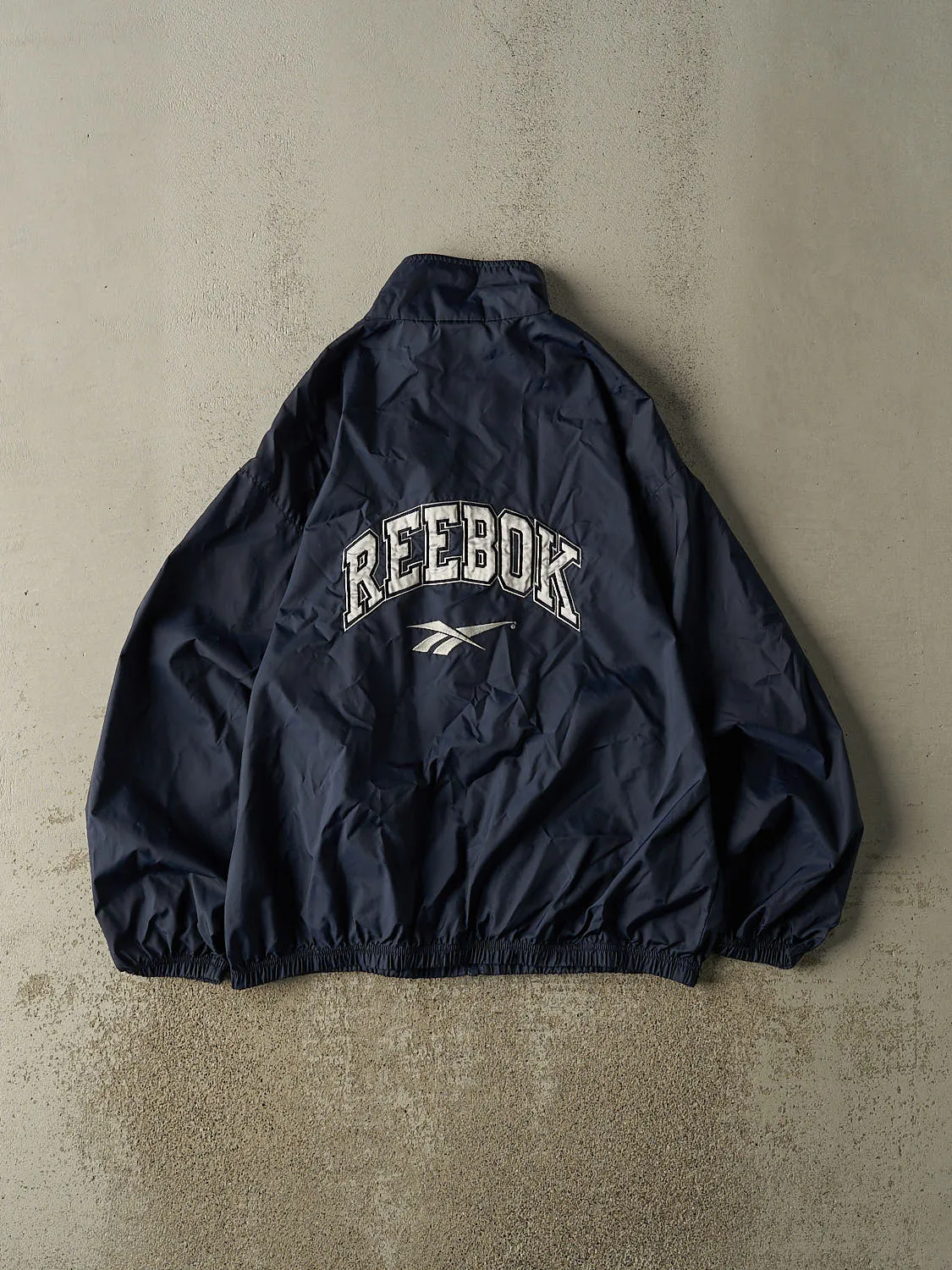 Vintage 90s Navy Blue Reebok Zip Up Windbreaker Jacket (L/XL) sold by Rebalance Vintage product image thumbnail 2