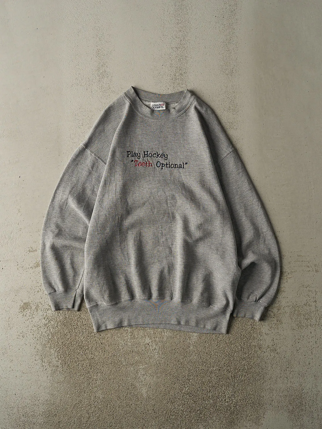Vintage 90s Grey "Play Hockey, Teeth Optional" Slogan Crewneck (L/XL) sold by Rebalance Vintage