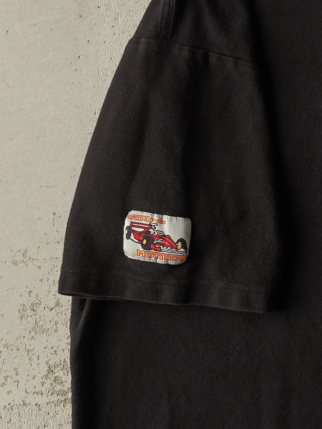 Vintage 90s Black Monaco Grand Prix Quarter Button Tee (L) sold by Rebalance Vintage product image thumbnail 3