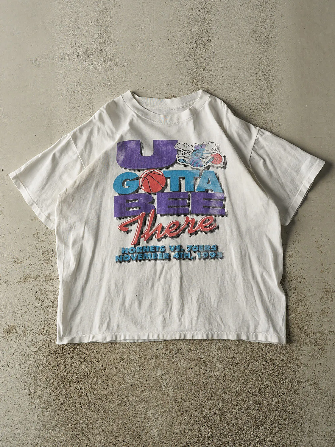 Vintage 95' White Charlotte Hornets "U Gotta Bee There" Tee (L) sold by Rebalance Vintage