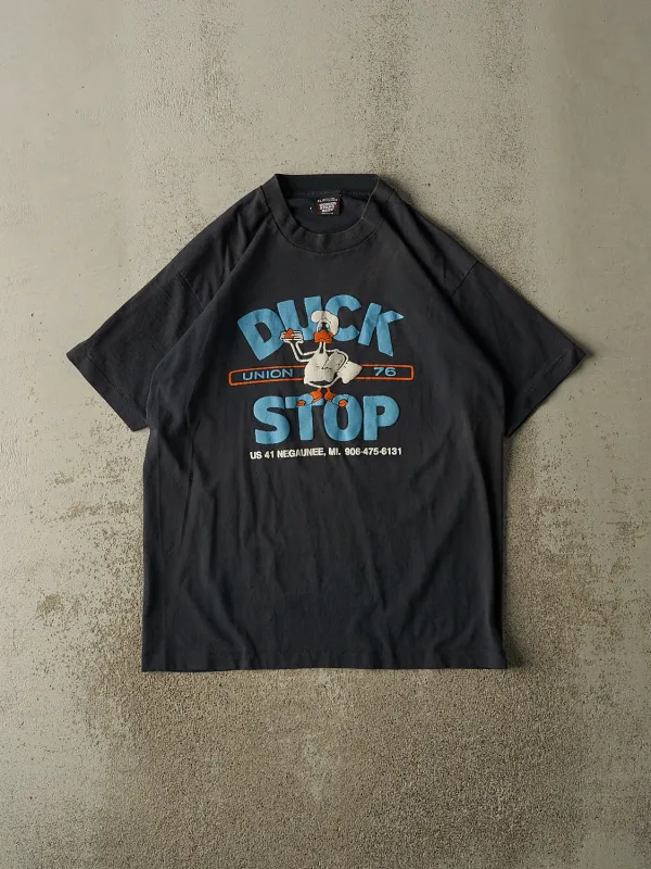 Vintage 90s Black Duck Stop Tee (L) sold by Rebalance Vintage