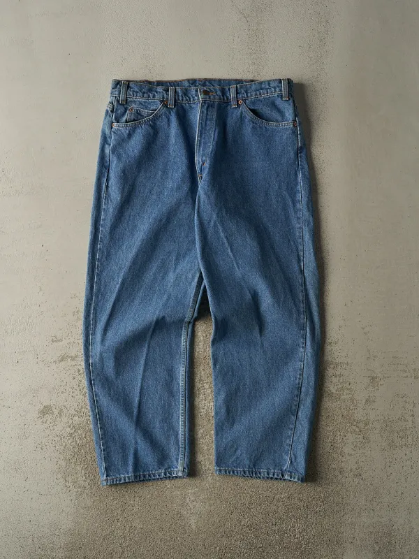 Vintage 80s Mid Wash Levi's Orange Tab 665 Jeans (37x30.5) sold by Rebalance Vintage