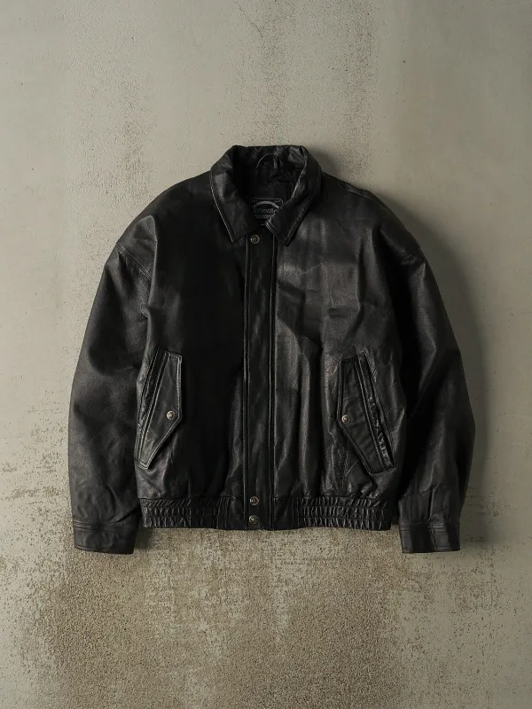 Vintage 90s Black St. John's Bay Leather Bomber Jacket (L/XL) made by Rebalance Vintage