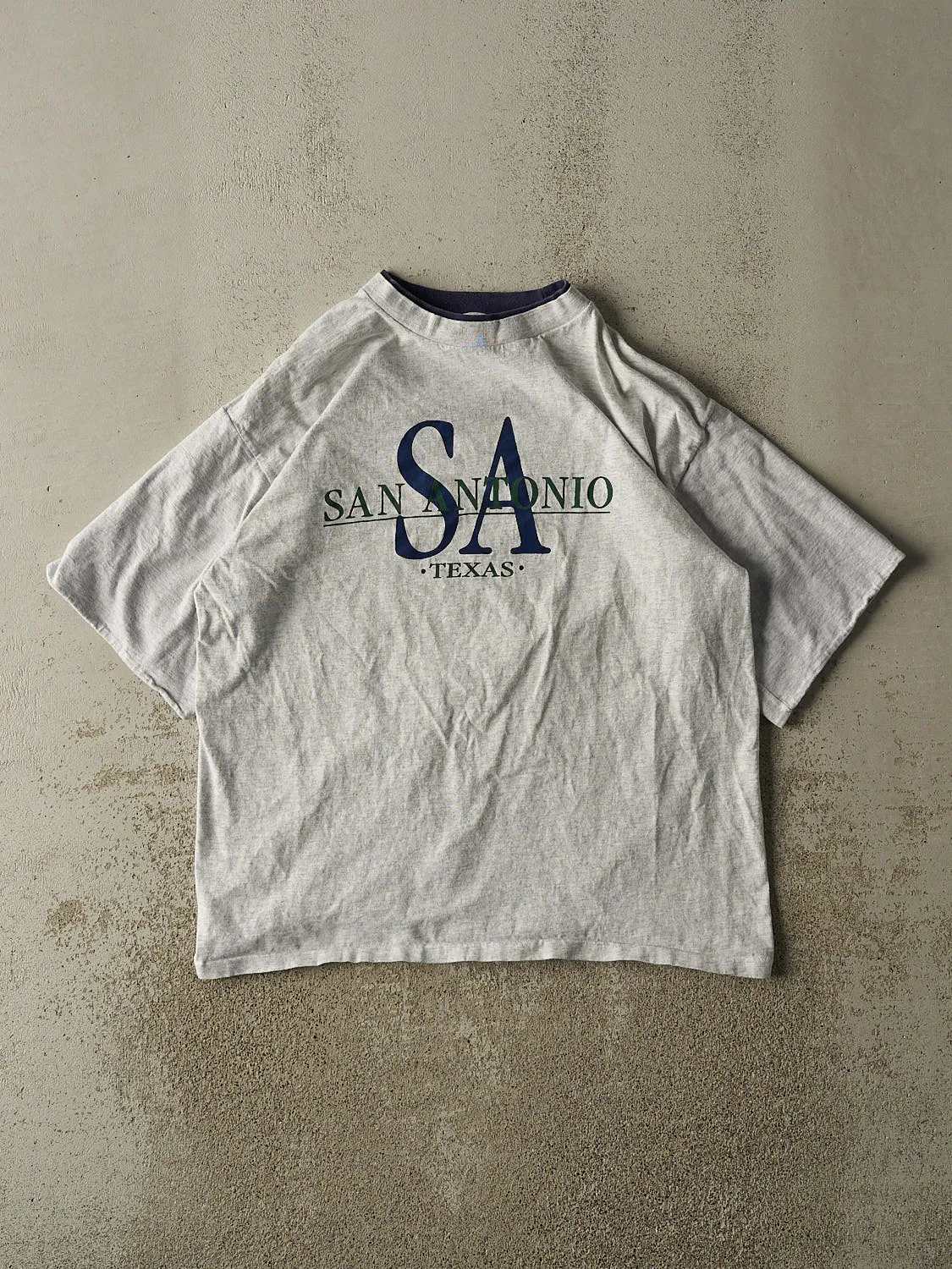 Vintage 90s Heather Grey San Antonio Texas Embroidered Double Neck Tee (L/XL) sold by Rebalance Vintage