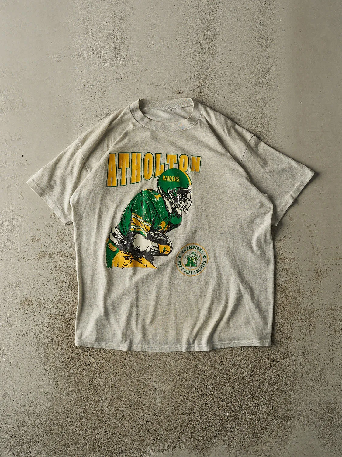 Vintage 80s Heather Grey Atholton Champions Tee (L/XL) sold by Rebalance Vintage