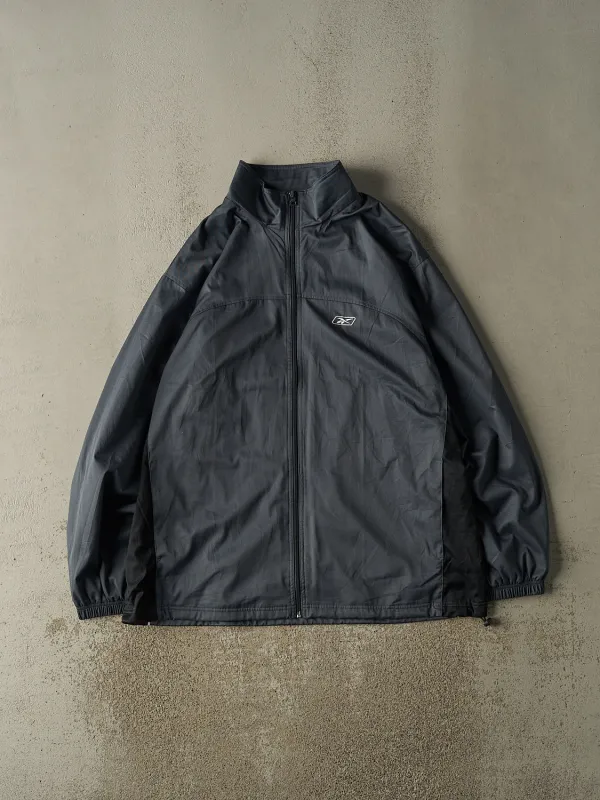 Vintage Y2K Charcoal Grey Reebok Windbreaker Jacket (XXL) made by Rebalance Vintage