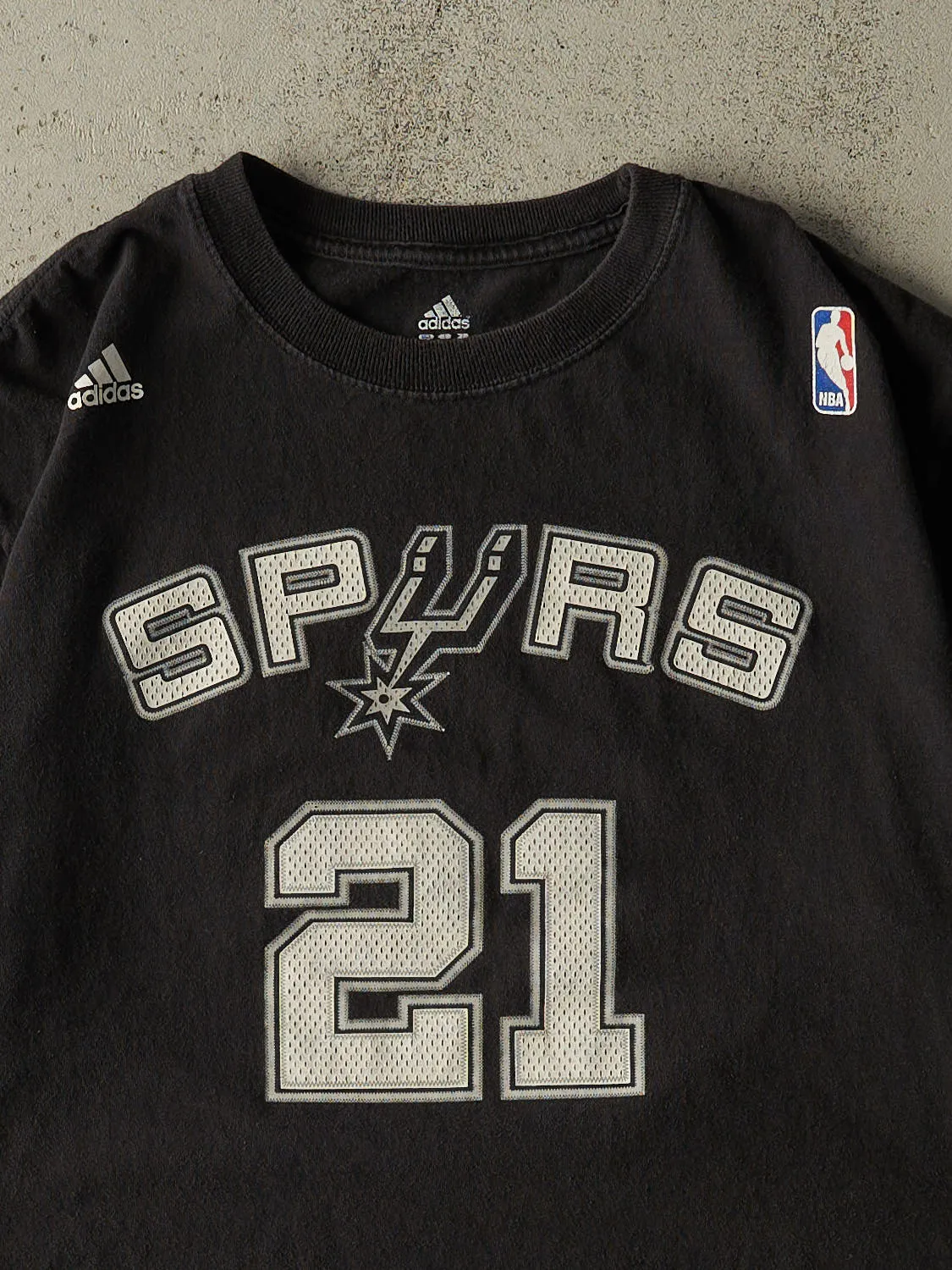 Vintage Y2K Black San Antonio Spurs #21 Tim Duncan Tee (L) sold by Rebalance Vintage product image thumbnail 3