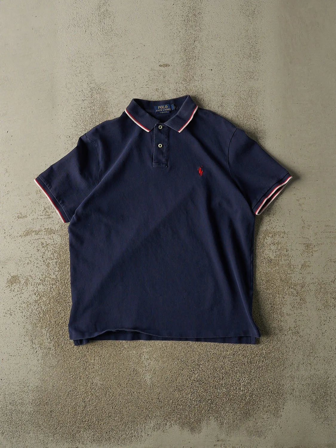 Vintage Y2K Navy Blue Polo Embroidered Quarter Button Tee (M/L) sold by Rebalance Vintage