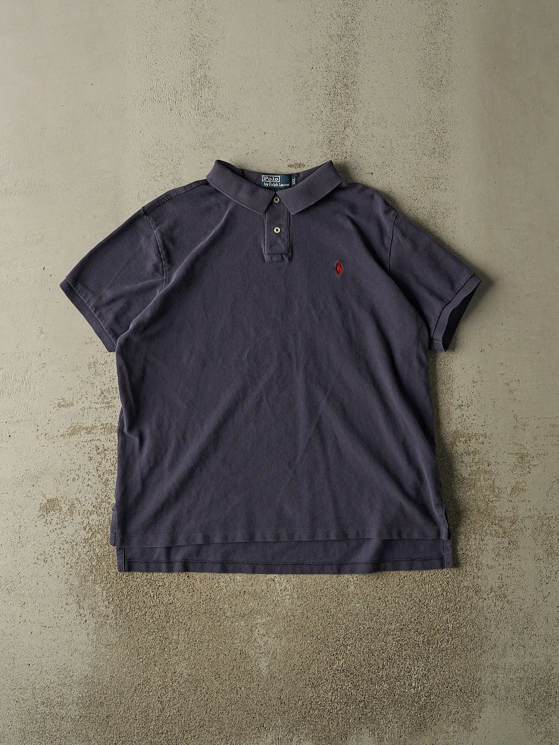Vintage 90s Navy Blue Polo Embroidered Quarter Button Tee (L/XL) sold by Rebalance Vintage