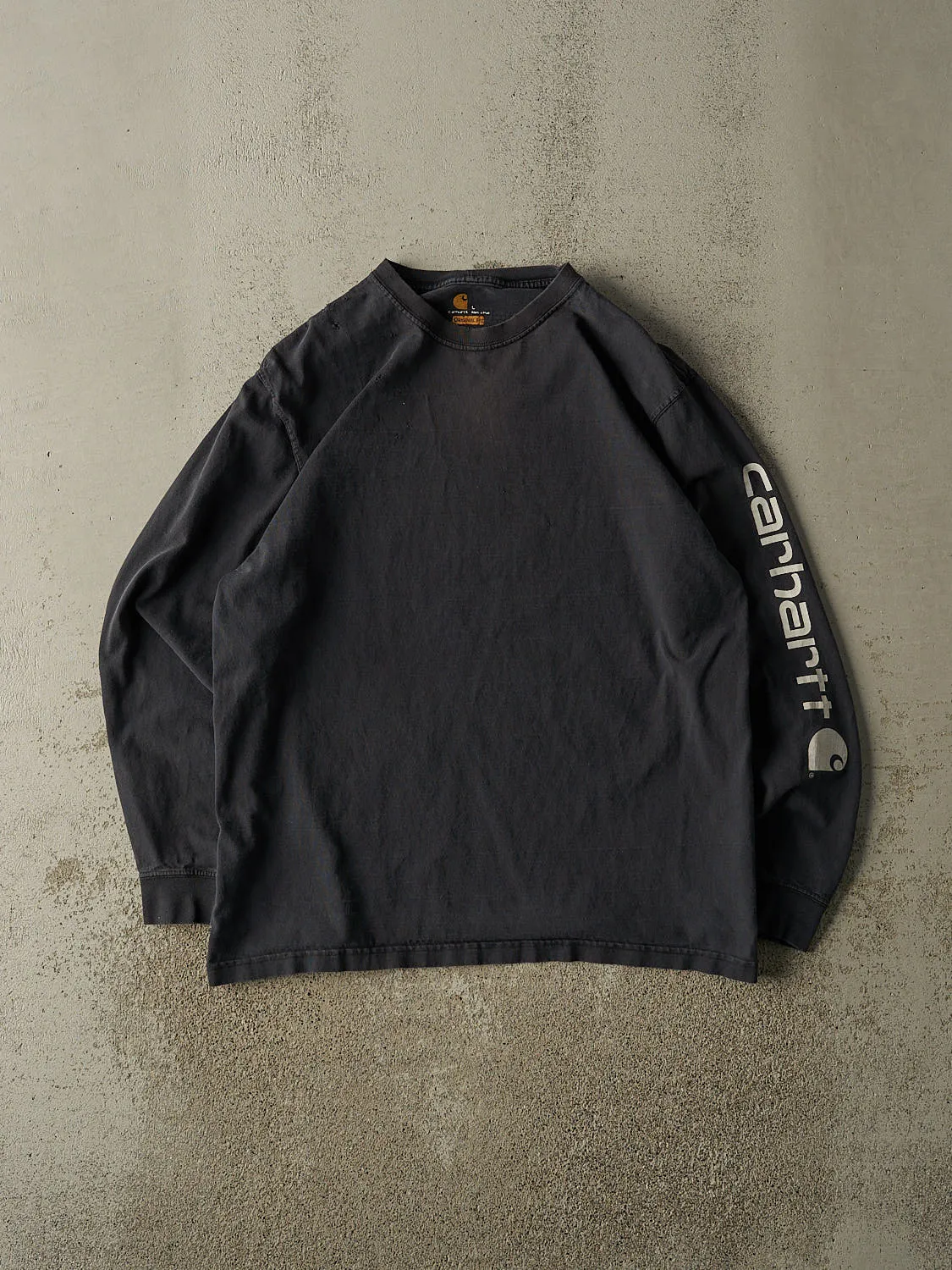 Vintage Y2K Faded Black Carhartt Long Sleeve (L/XL) sold by Rebalance Vintage
