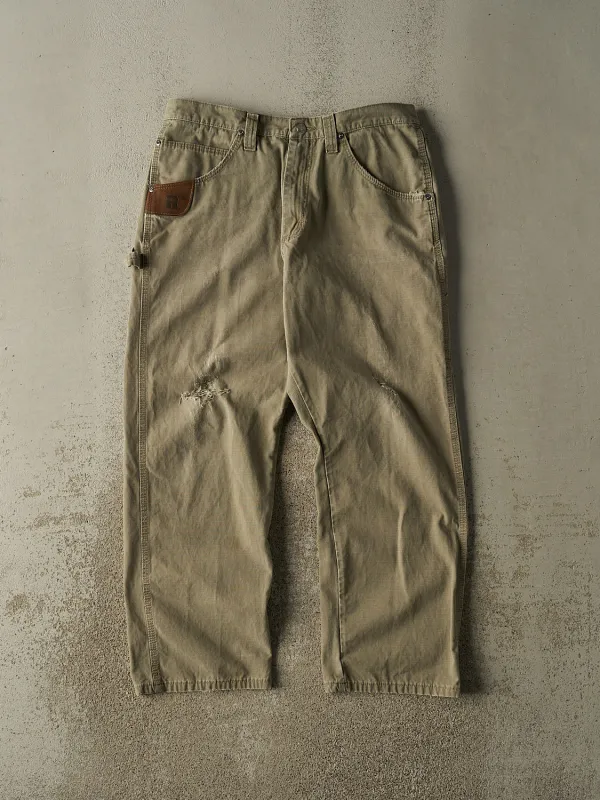 Vintage 90s Beige Wrangler Riggs Carpenter Work Pants (34x28.5) made by Rebalance Vintage