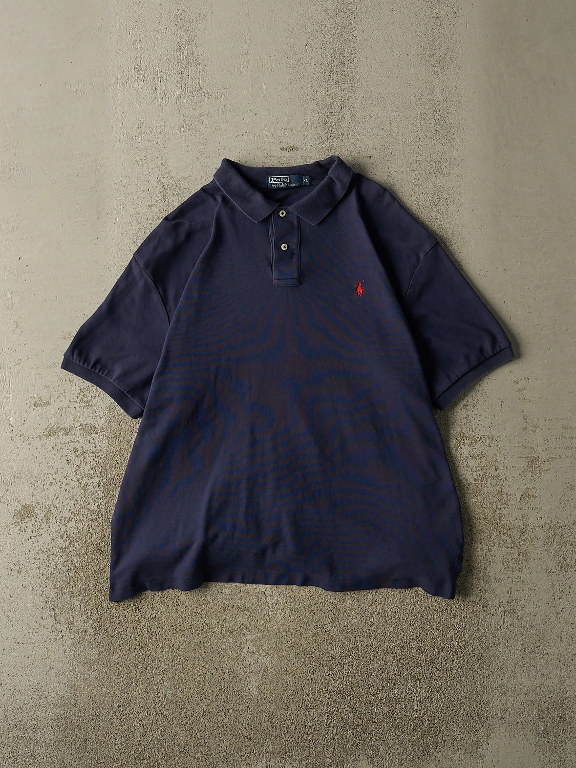 Vintage 90s Navy Blue Polo Quarter Button Tee (L/XL) sold by Rebalance Vintage