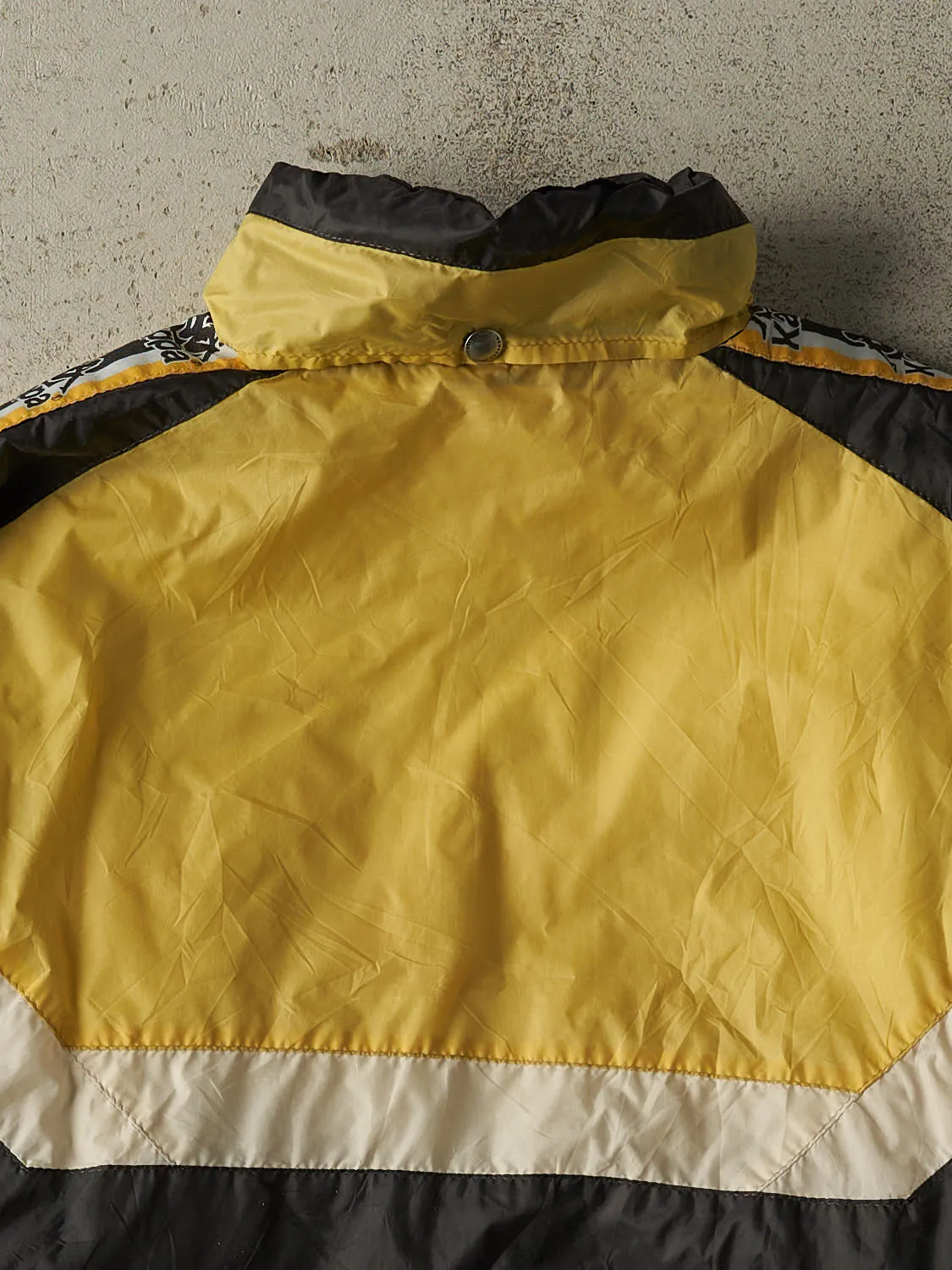 Vintage 90s Black & Yellow Kappa Windbreaker Jacket (L/XL) sold by Rebalance Vintage product image thumbnail 4