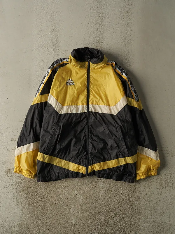 Vintage 90s Black & Yellow Kappa Windbreaker Jacket (L/XL) sold by Rebalance Vintage