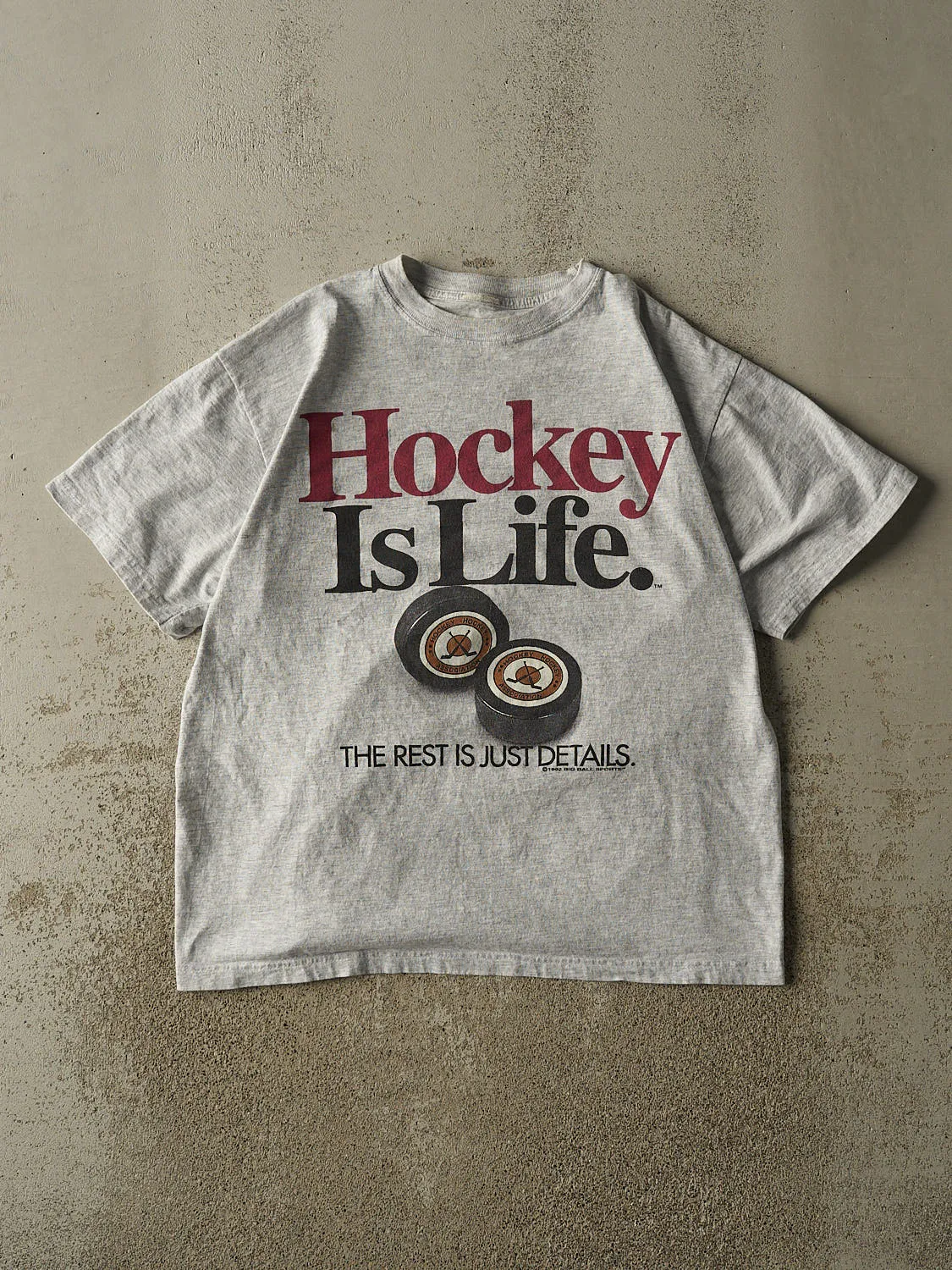Vintage 90s Heather Grey Hockey Is Life Tee (L/XL) sold by Rebalance Vintage