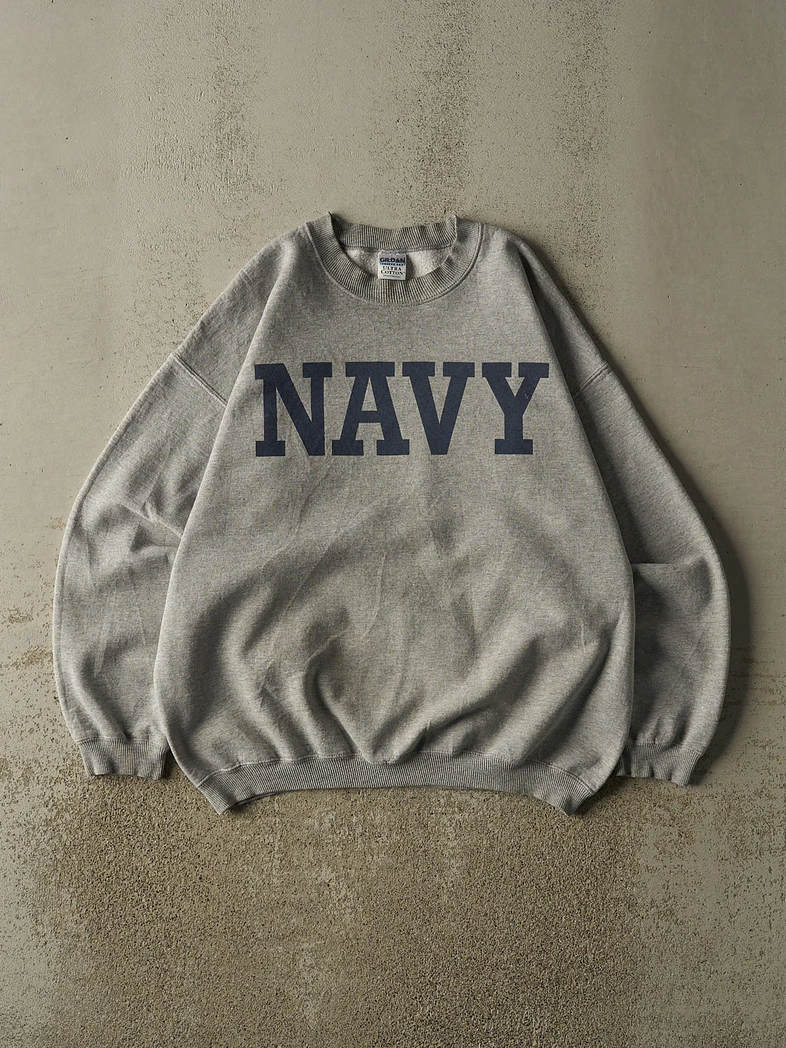 Vintage Y2K Grey US Navy Crewneck (L/XL) sold by Rebalance Vintage