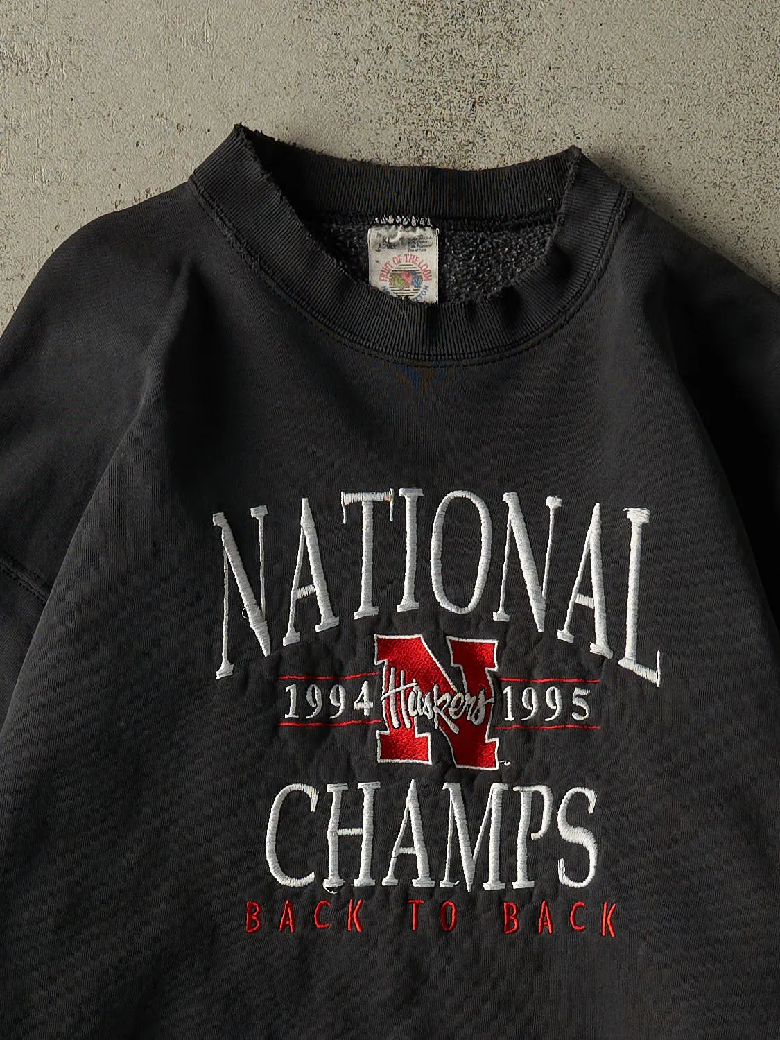 Vintage 95' Faded Black Nebraska University Embroidered Crewneck (L) sold by Rebalance Vintage product image thumbnail 2
