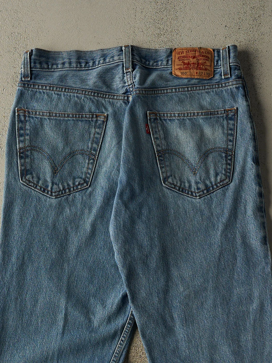 Vintage 90s Mid Wash Levi's 550 Jeans (33x29.5) sold by Rebalance Vintage product image thumbnail 5
