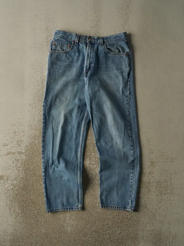 Vintage 90s Mid Wash Levi's 550 Jeans (33x29.5) made by Rebalance Vintage