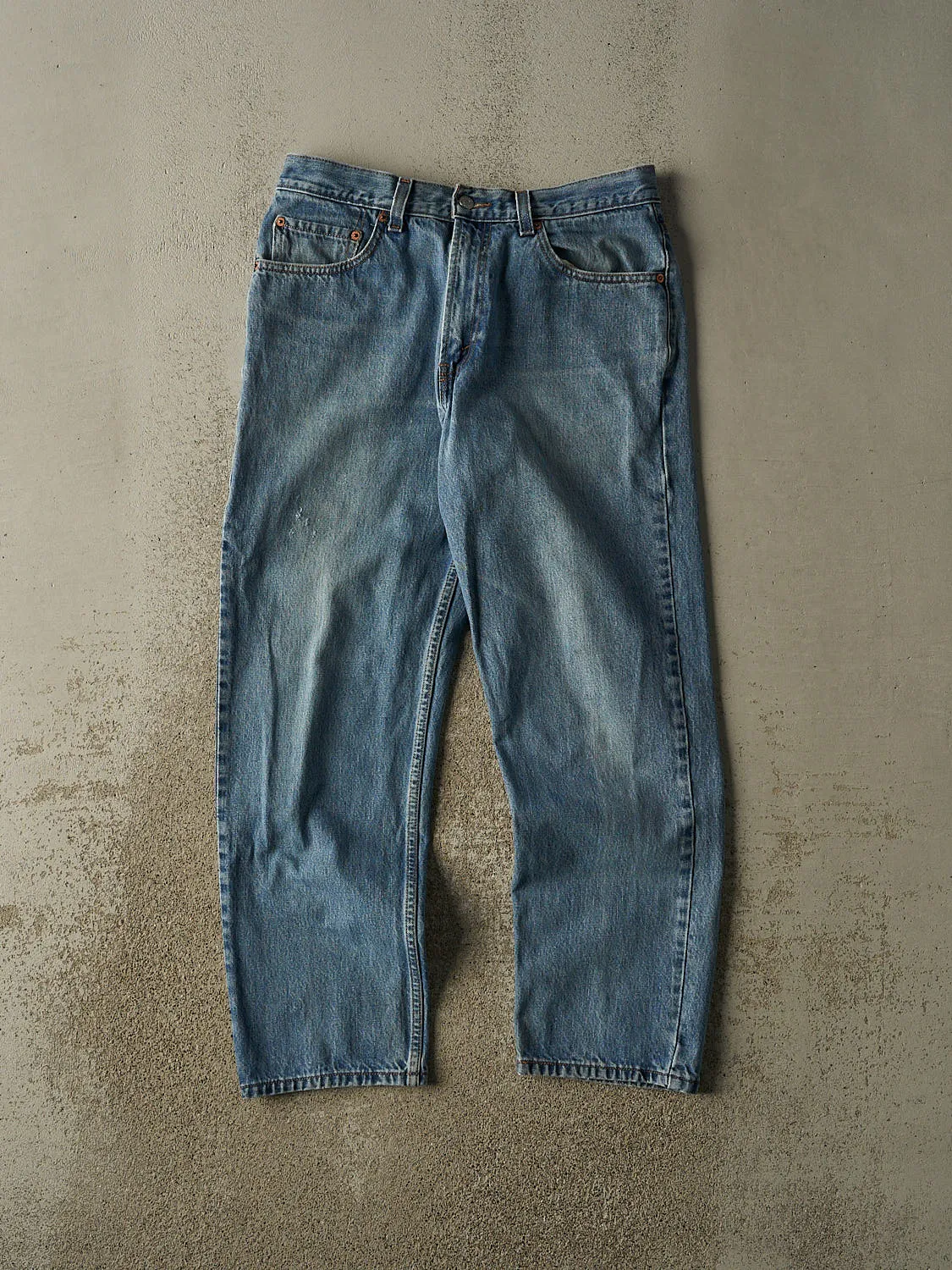 Vintage 90s Mid Wash Levi's 550 Jeans (33x29.5) sold by Rebalance Vintage