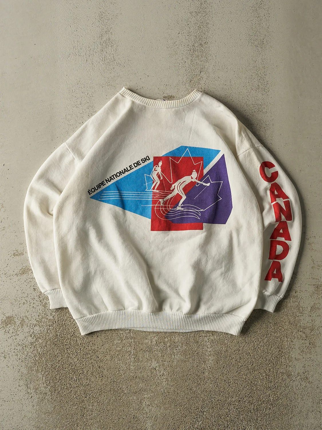 Vintage 80s White Canada Skiing Crewneck (M/L) sold by Rebalance Vintage