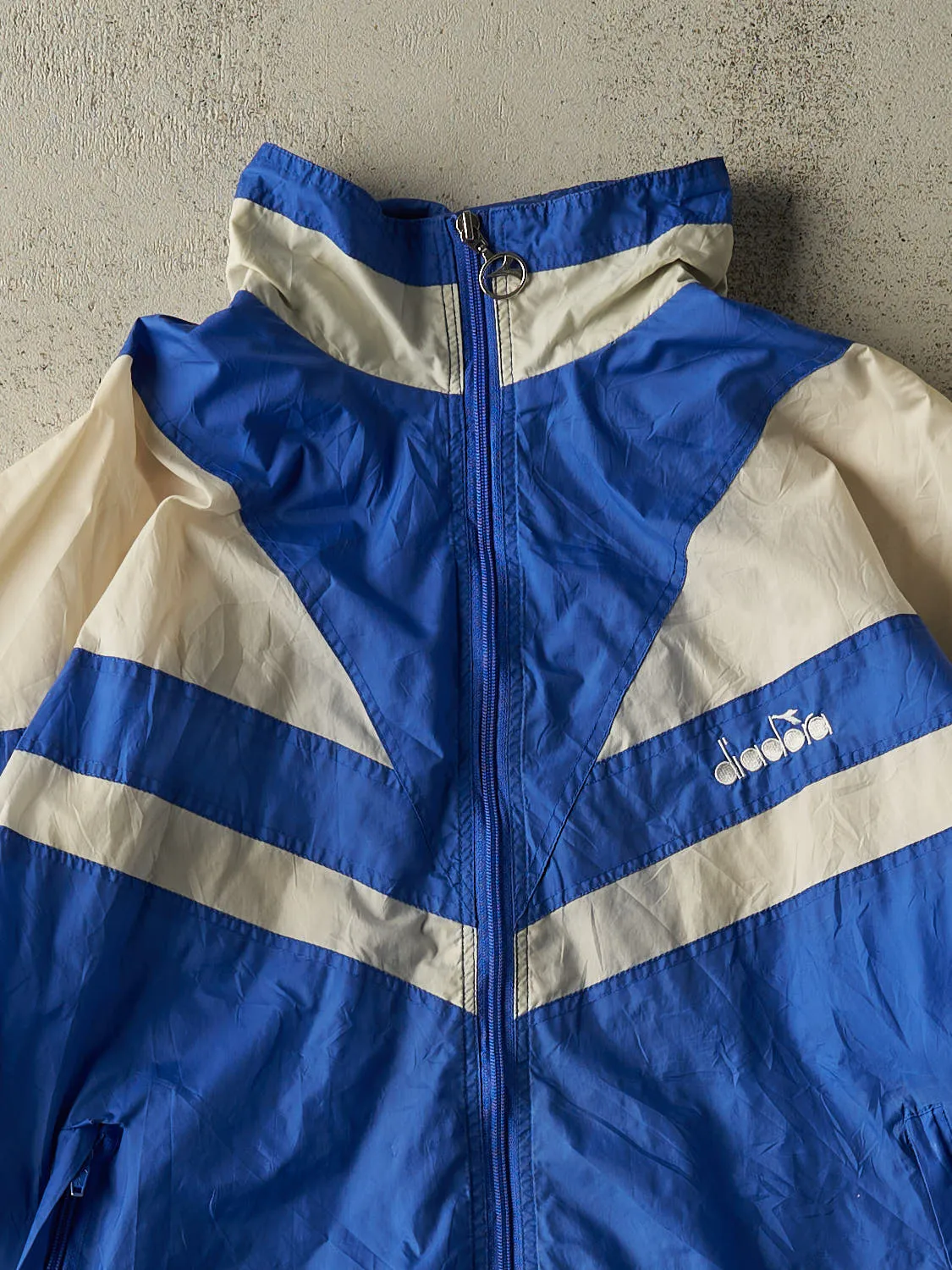 Vintage 90s Blue & White Diadora Embroidered Windbreaker Jacket (L/XL) sold by Rebalance Vintage product image thumbnail 3