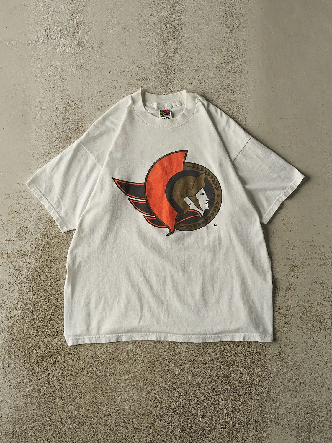 Vintage 90s White Ottawa Senators Tee (L) sold by Rebalance Vintage
