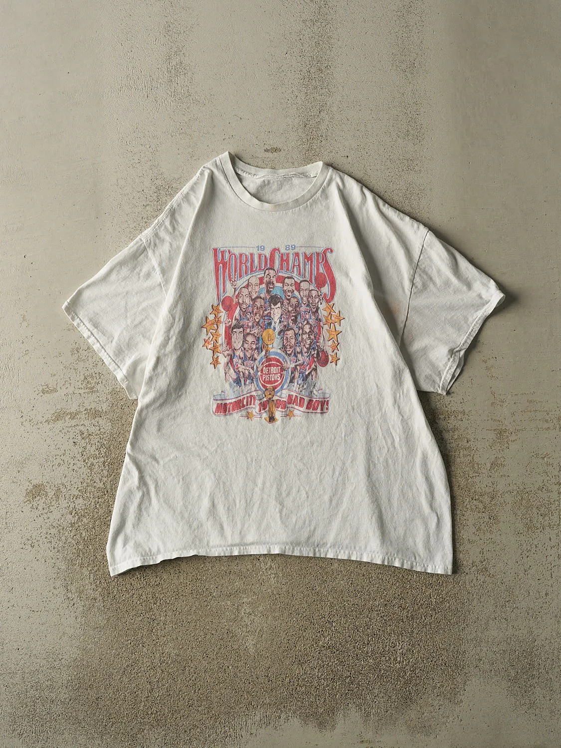 Vintage Y2K White Detroit Pistons 89' World Champs Bootleg Tee (L/XL) sold by Rebalance Vintage