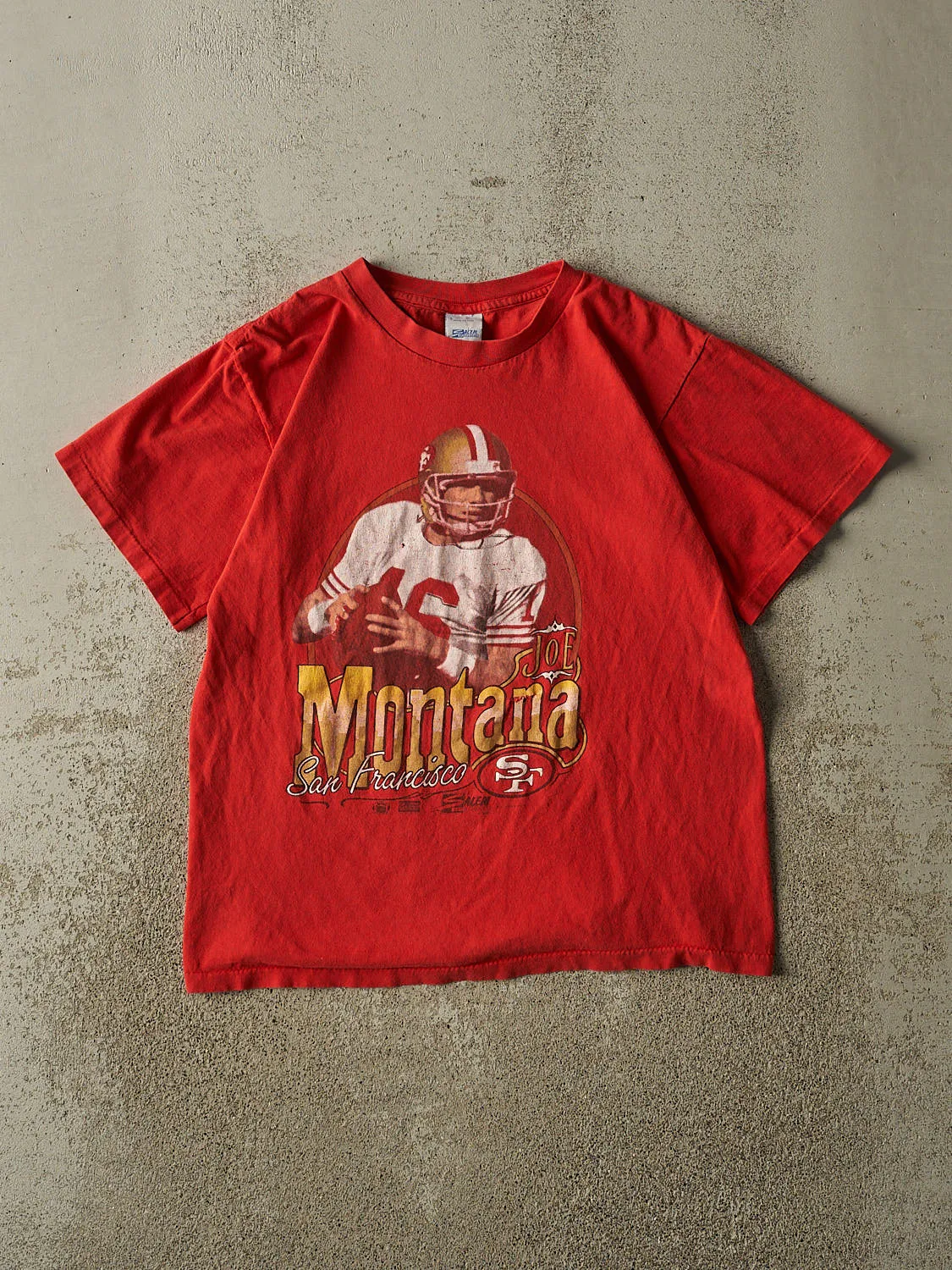 Vintage 90' Red San Francisco 49ers Joe Montana Single Stitch Tee (S/M) sold by Rebalance Vintage
