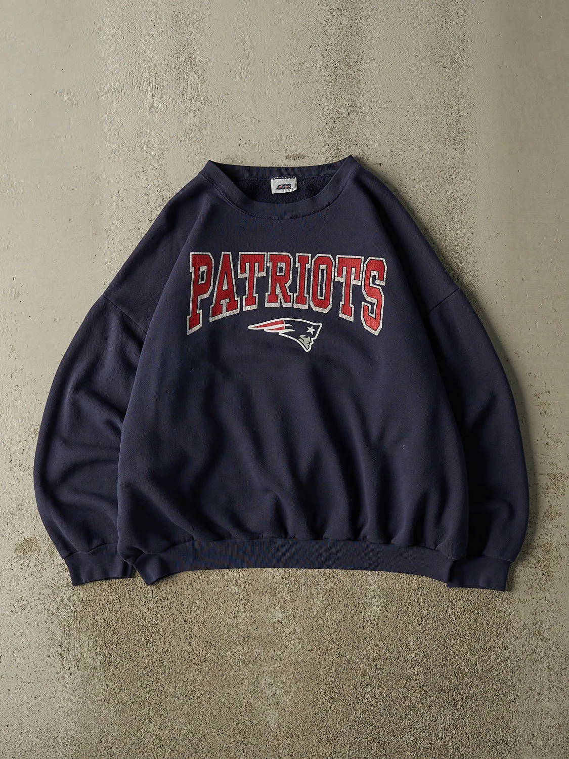 Vintage 90s Navy Blue New England Patriots Crewneck (XL) sold by Rebalance Vintage