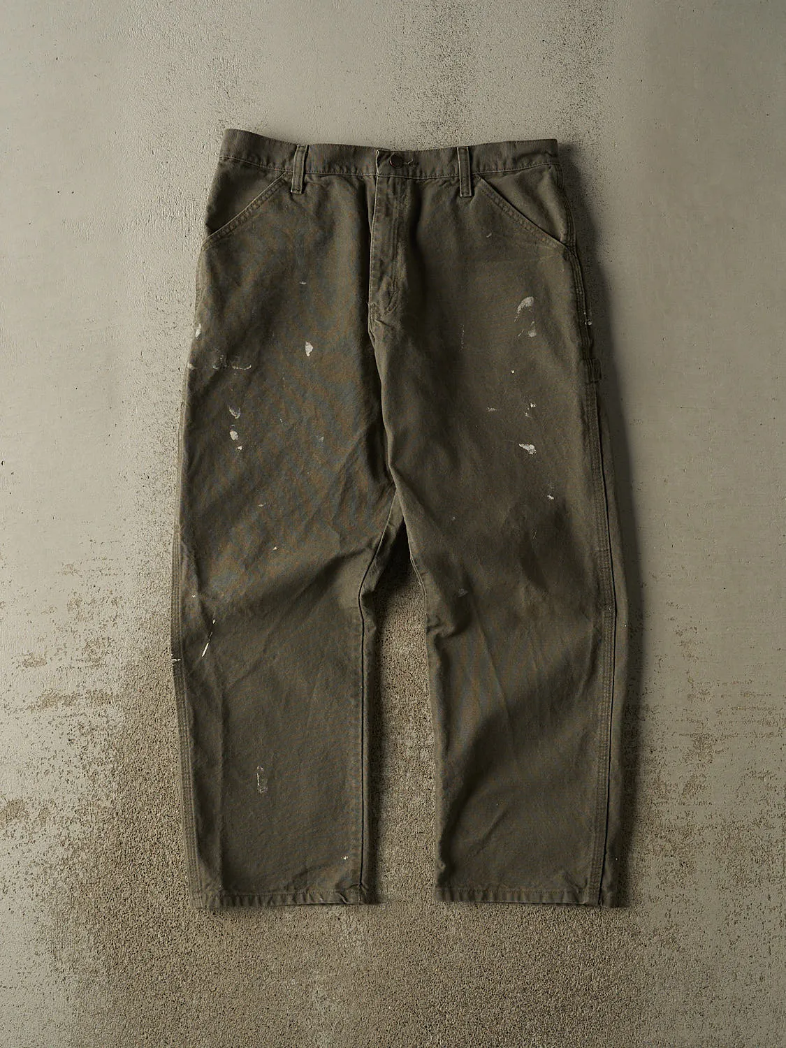 Vintage 90s Green Rustler Carpenter Pants (33x28) sold by Rebalance Vintage