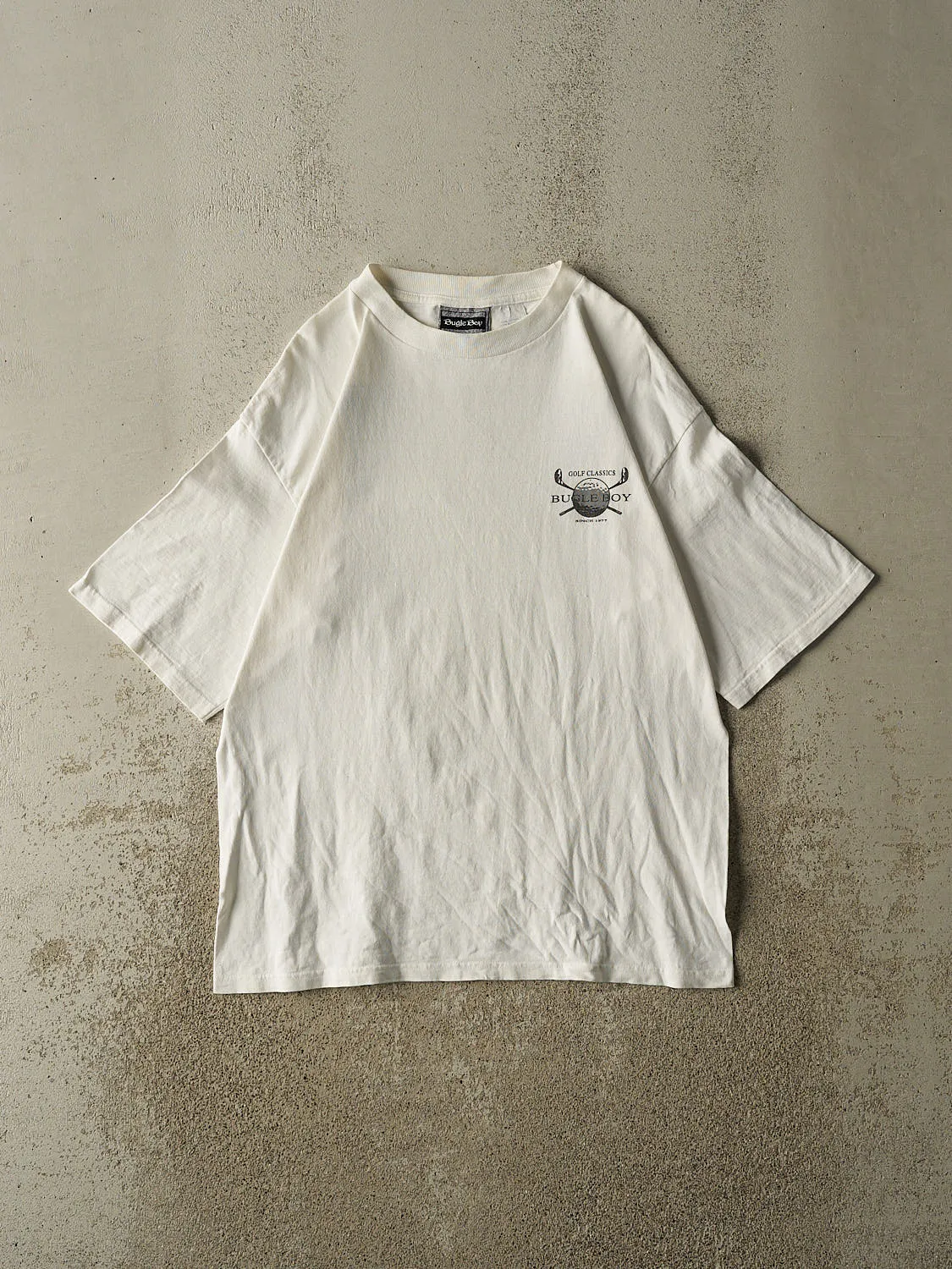 Vintage 90s White Bugle Boy Golf Tee (M/L) sold by Rebalance Vintage