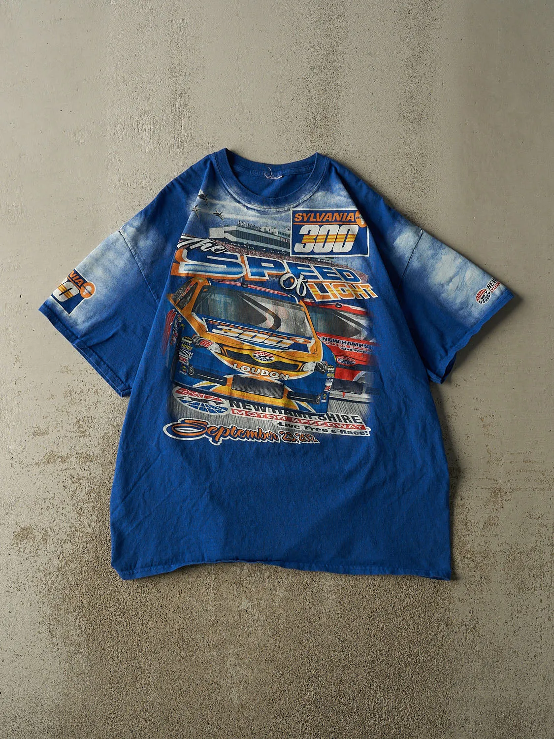 Vintage 12' Blue Sylvania AOP Racing Tee (XL) sold by Rebalance Vintage