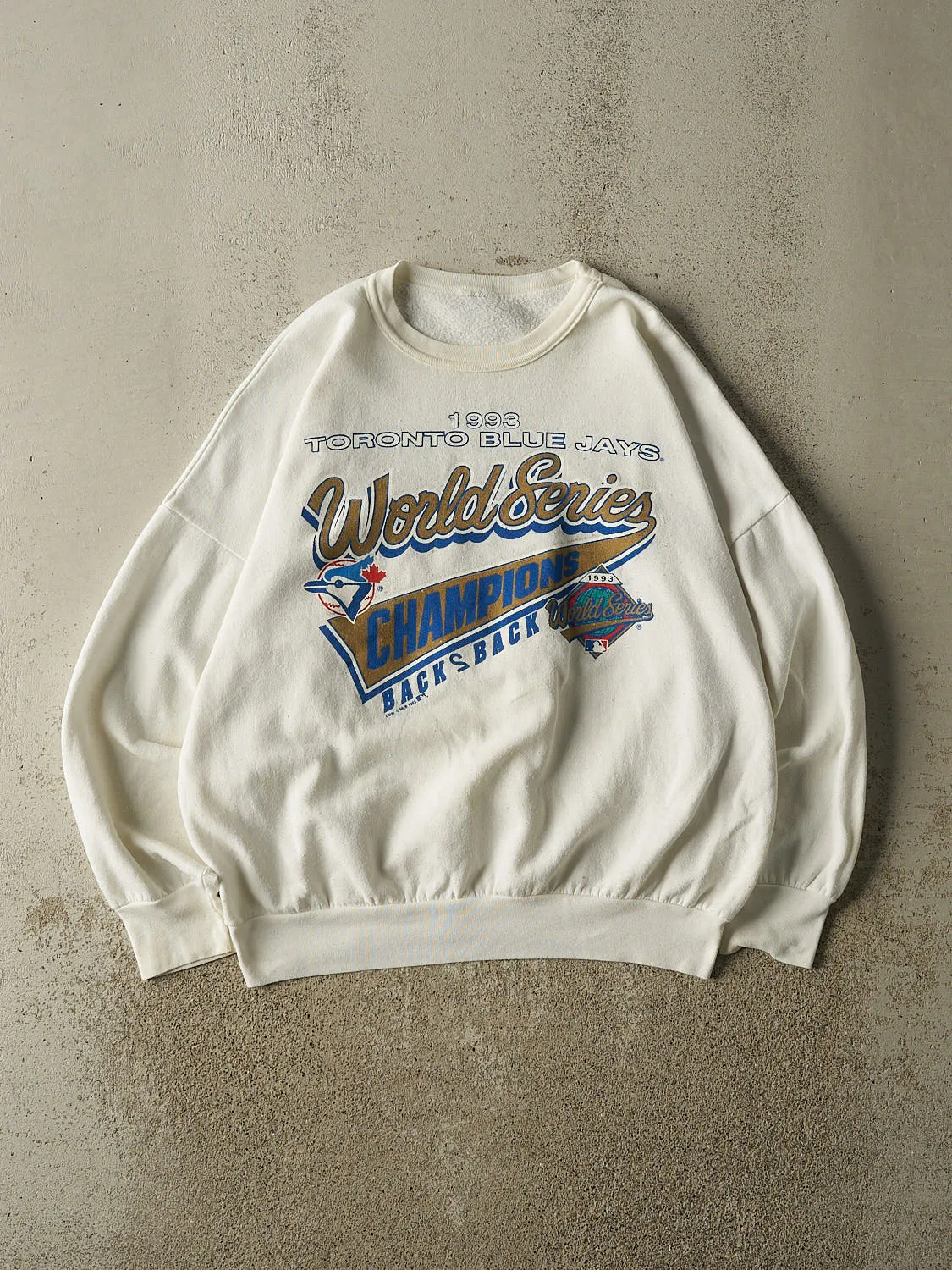 Vintage 93' White Toronto Blue Jays World Series Champion Crewneck (L) sold by Rebalance Vintage