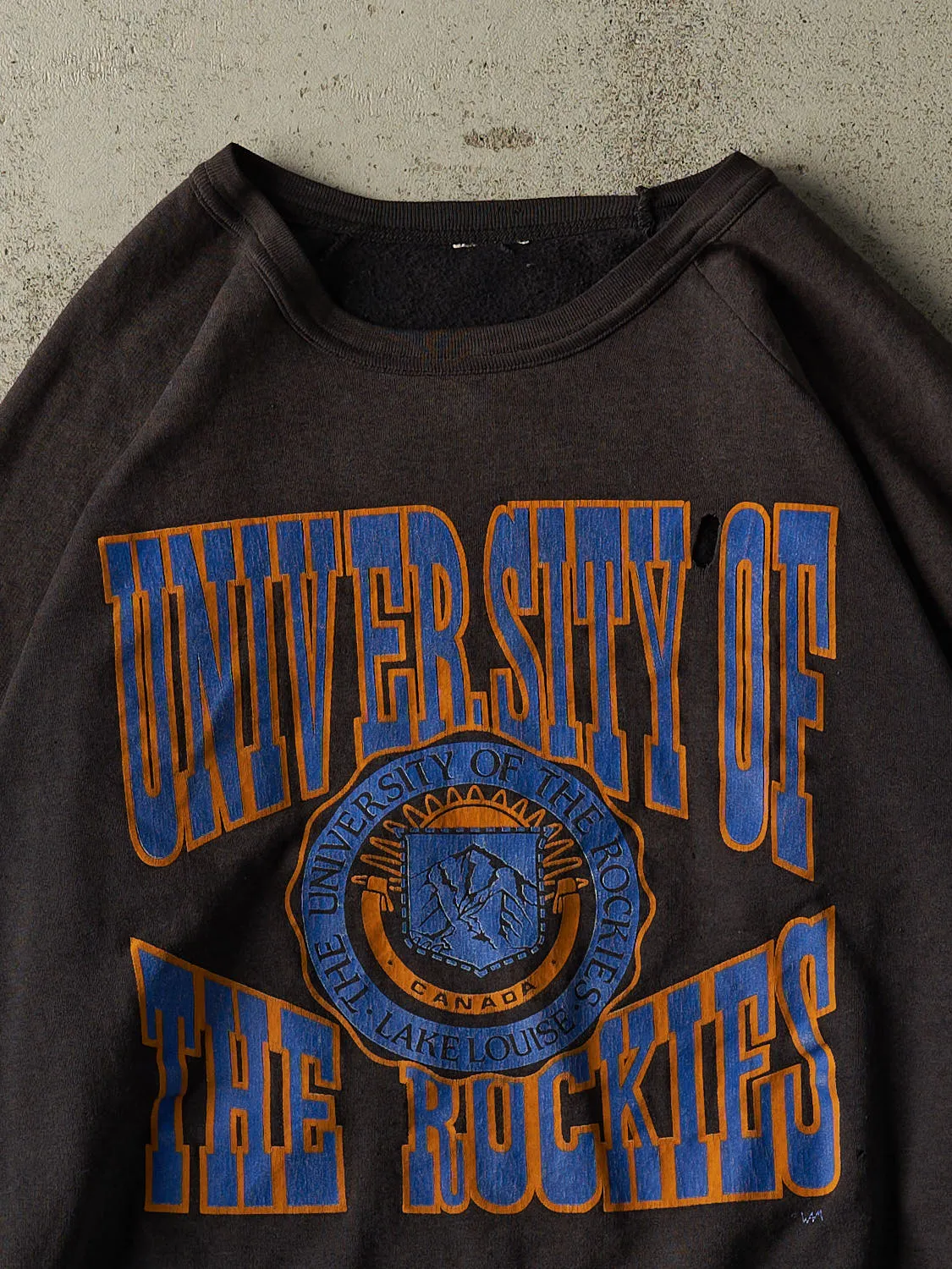 Vintage 80s Sun Faded Black University of the Rockies Crewneck (XL) sold by Rebalance Vintage product image thumbnail 2